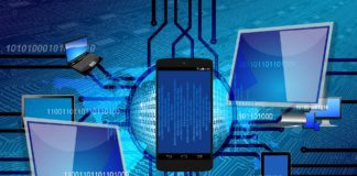 Two monitors, smartphone, and other devices connected via chip wiring overlay