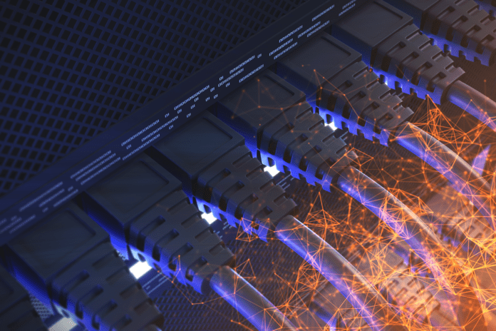 LAN cables connected to a hub with a network of nodes overlay.