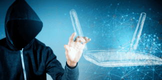 A man in a hood clicks on the virtual display of a router.