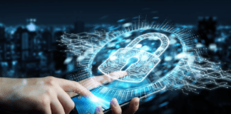 Businessman using a mobile phone with a virtual digital lock icon overlay.