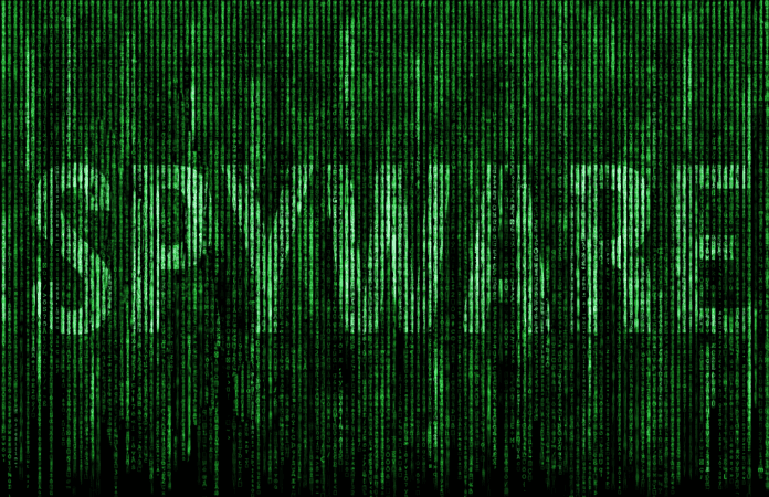 Spyware text hidden within a vertical stream of data.